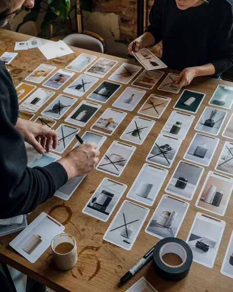 Creative review table with printed ad frames